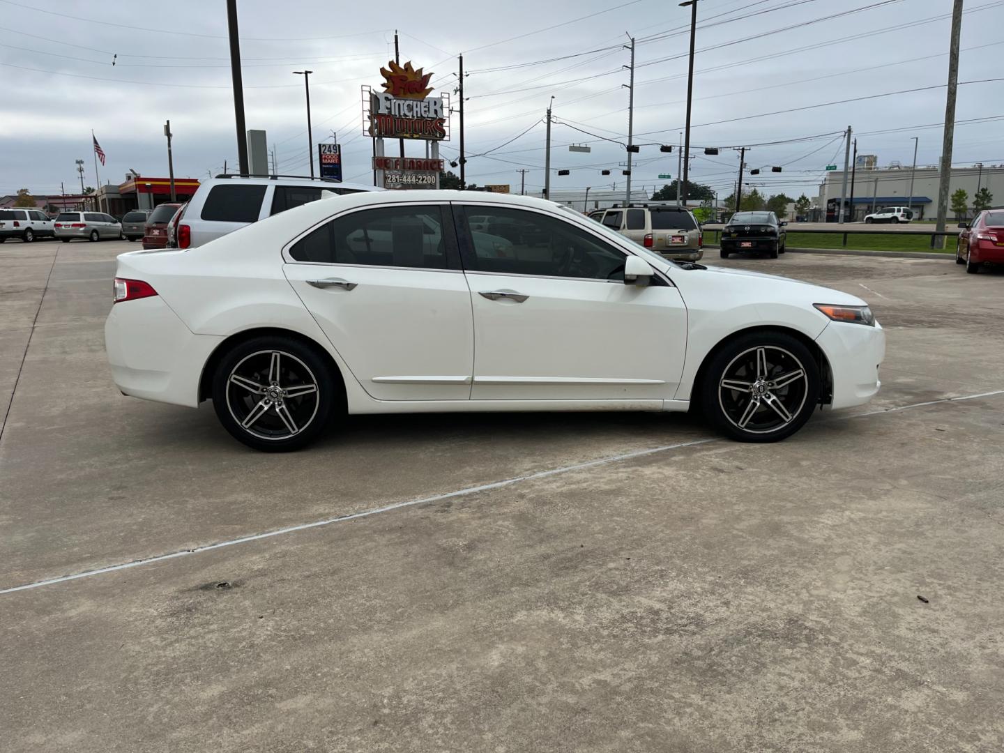 2009 white /TAN Acura TSX 5-Speed AT (JH4CU26639C) with an 2.4L L4 DOHC 16V engine, 5-Speed Automatic Overdrive transmission, located at 14700 Tomball Parkway 249, Houston, TX, 77086, (281) 444-2200, 29.928619, -95.504074 - Photo#7